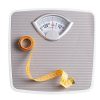 Tape Measure on Weight Scale isolated on white Weight scale (dummy)